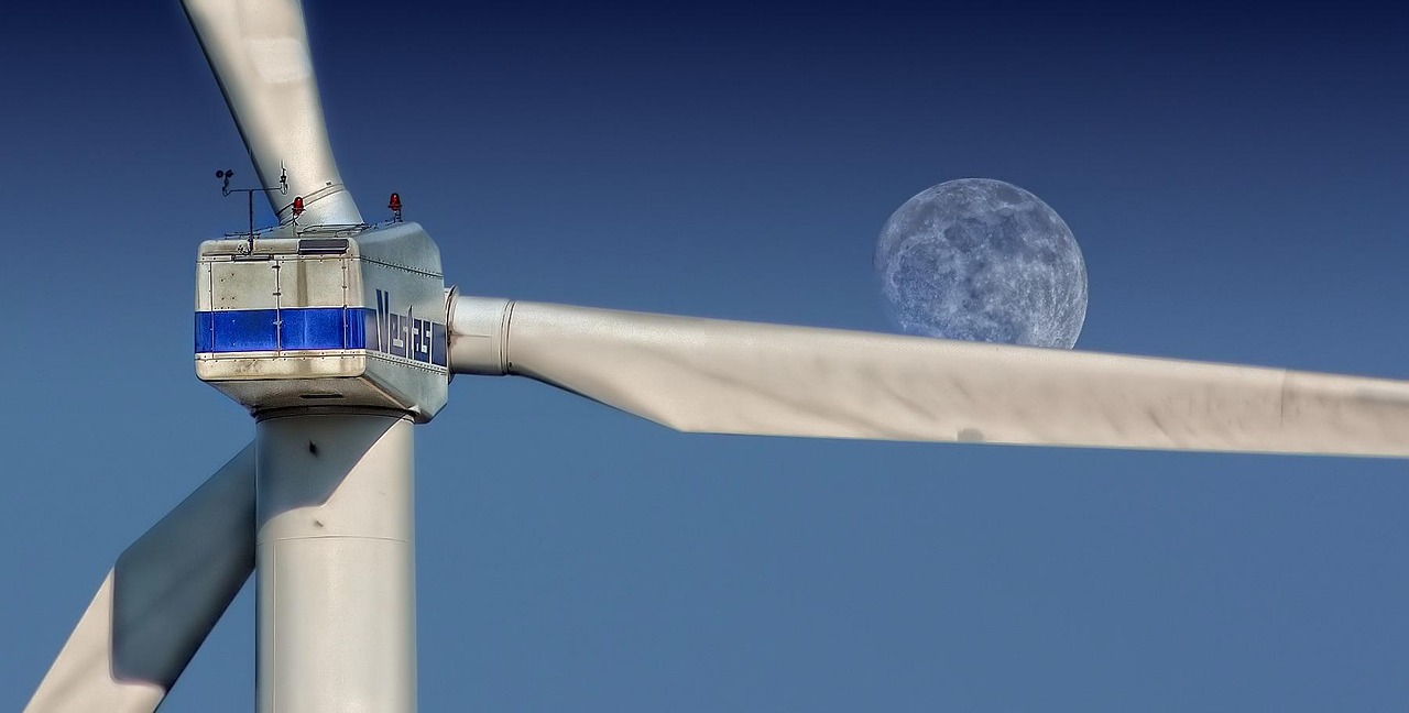 A wind turbine generating clean electricity — the kind of renewable energy that powers the hosting Fairweb builds on